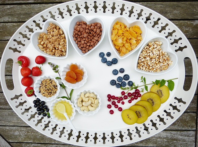 a selection of healthy cat treats and small pieces of cooked chicken
